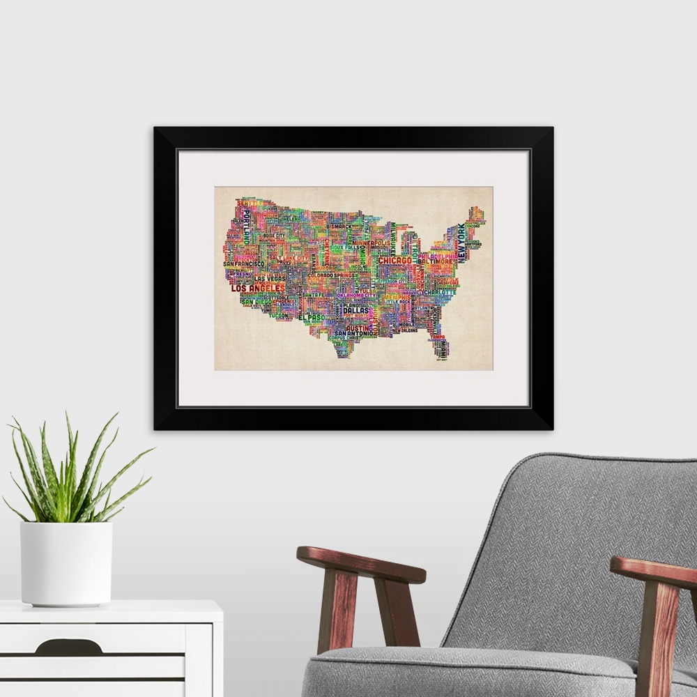 A modern room featuring Colorful map of America constructed using the names of each U.S. city.