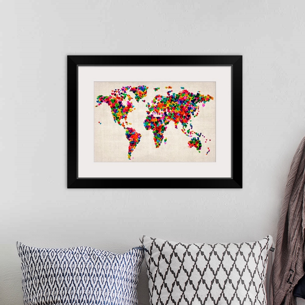 A bohemian room featuring Contemporary artwork of map with its continent shapes created by tiny colorful hearts.