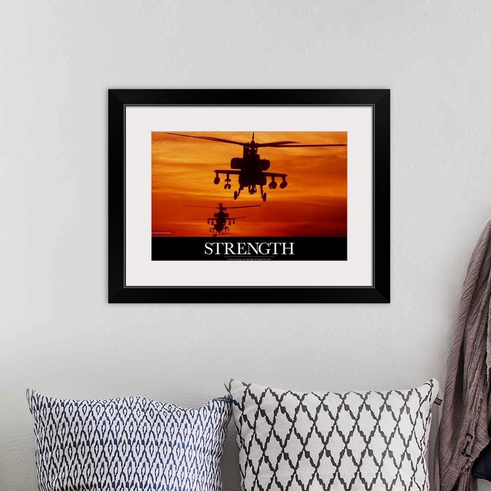 A bohemian room featuring Three military helicopters are photographed during a sunset and has the word "Strength" written i...