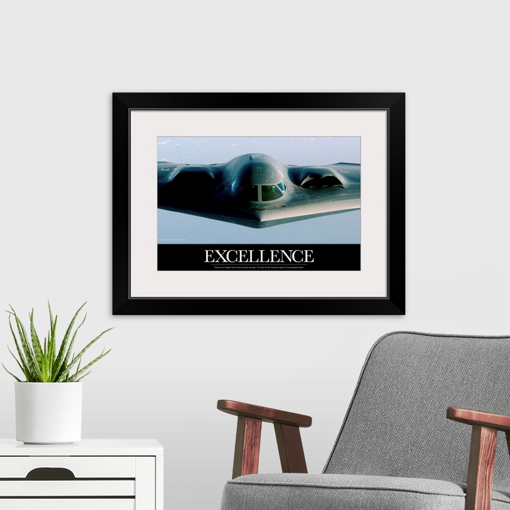 A modern room featuring A military aircraft is photographed straight on while its in flight. The word Excellence is typed...