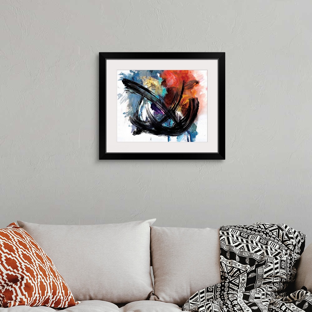 A bohemian room featuring Contemporary abstract artwork in bright, fiery colors with broad black strokes across the center.