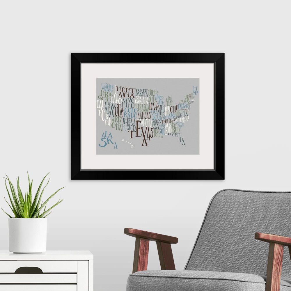 A modern room featuring A hand-drawn typography map of the United States with all the state names, in white, blue, and bl...