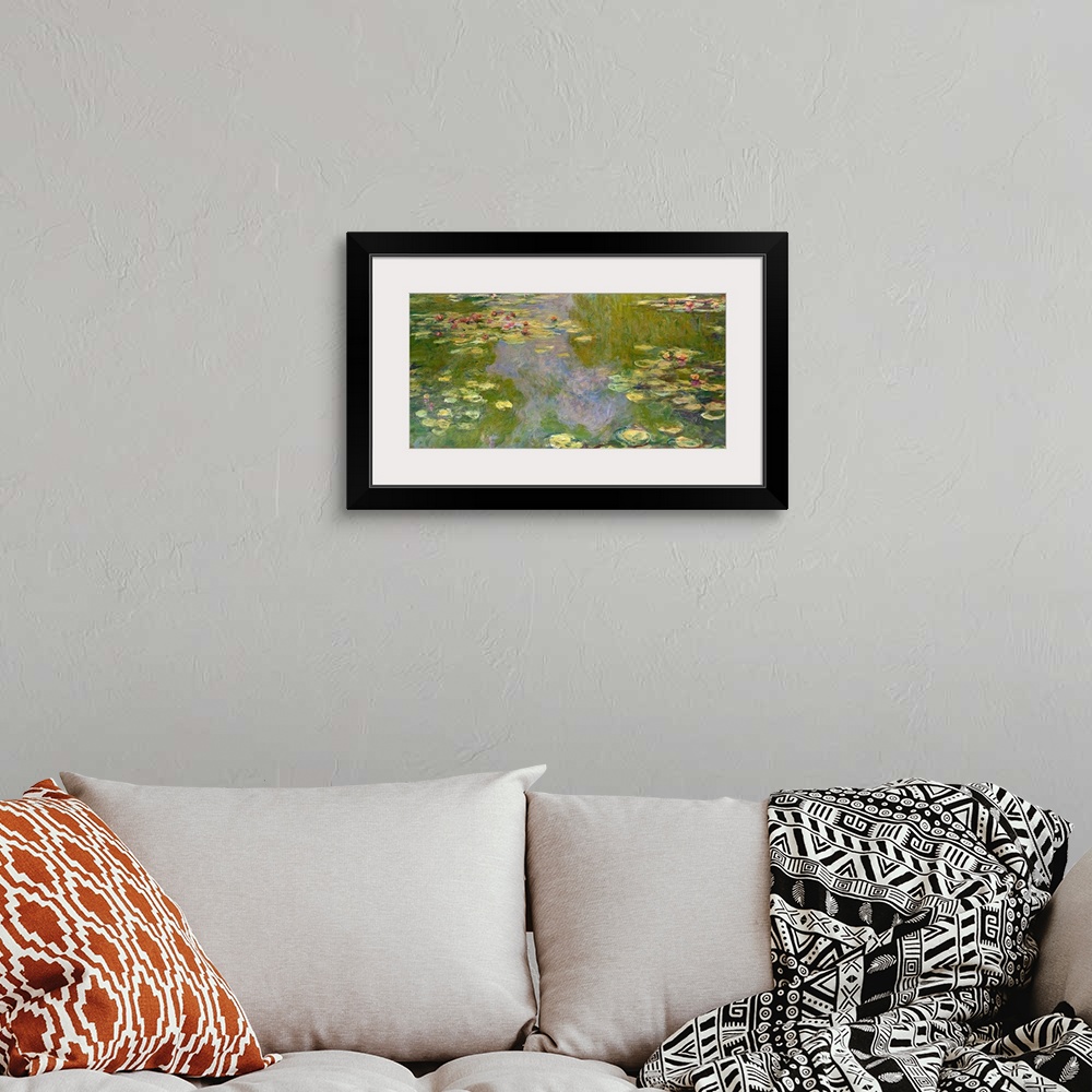A bohemian room featuring This work is one of four pictures of water lilies that, quite exceptionally, Monet finished, sign...