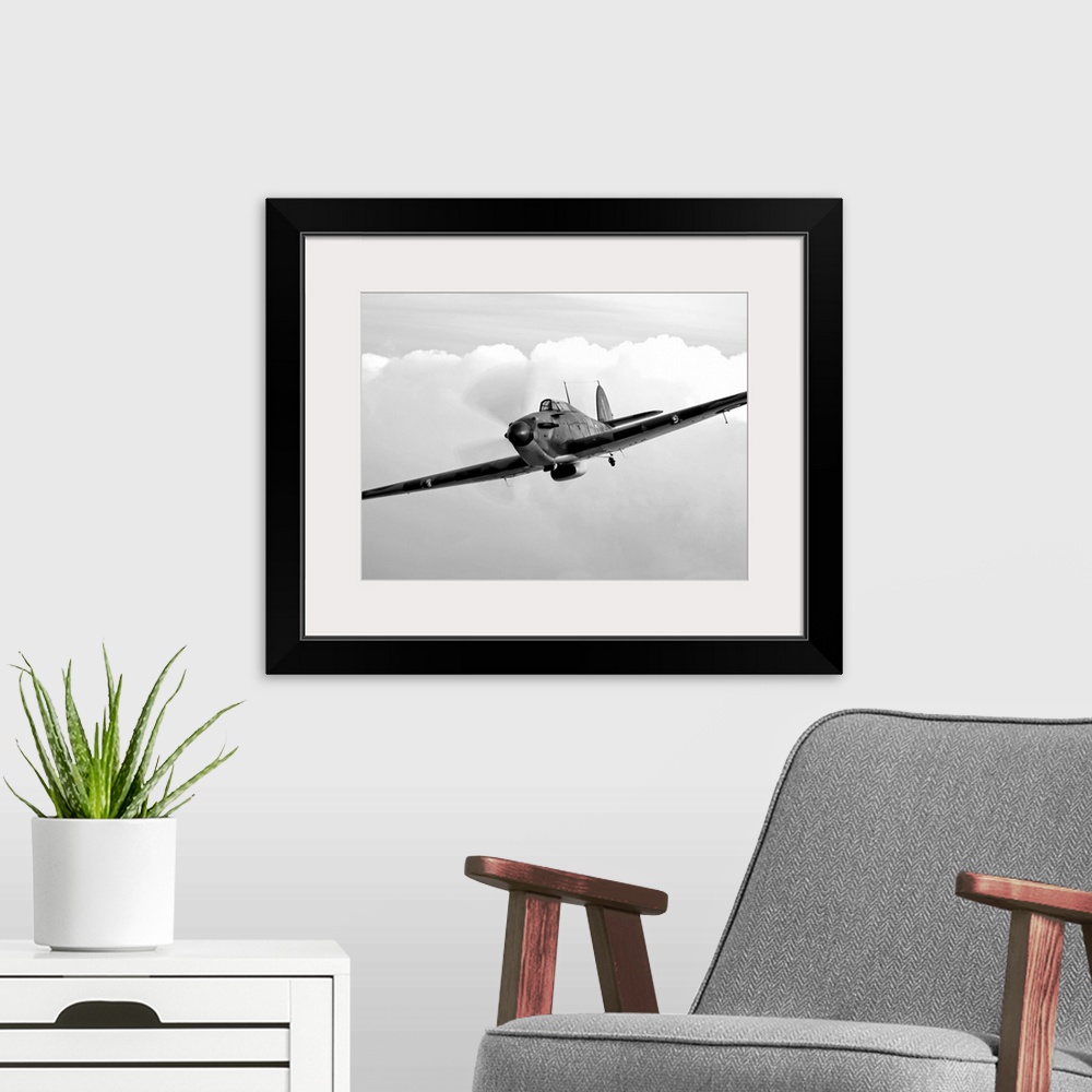 A modern room featuring A Hawker Hurricane aircraft in flight over Galveston, Texas.