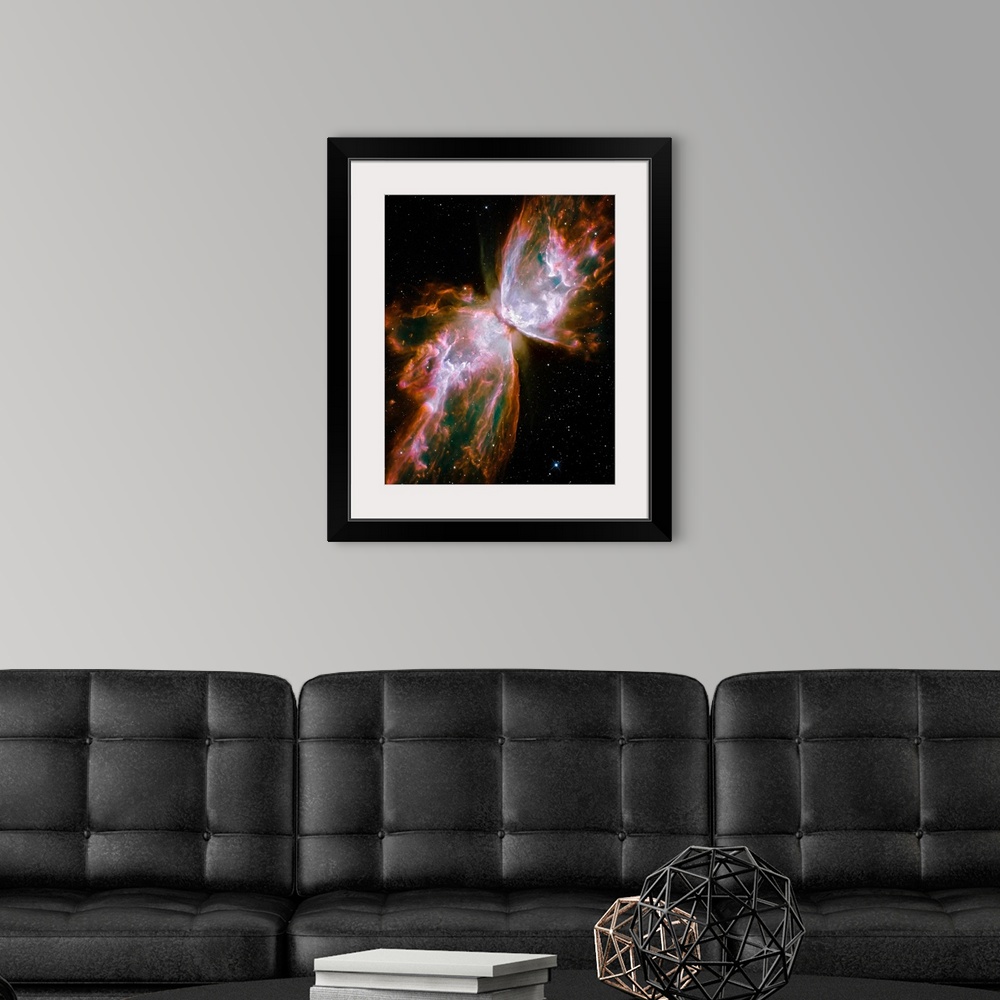 A modern room featuring Photograph of interstellar cloud of dust, hydrogen, and helium that is shaped like a winged insec...