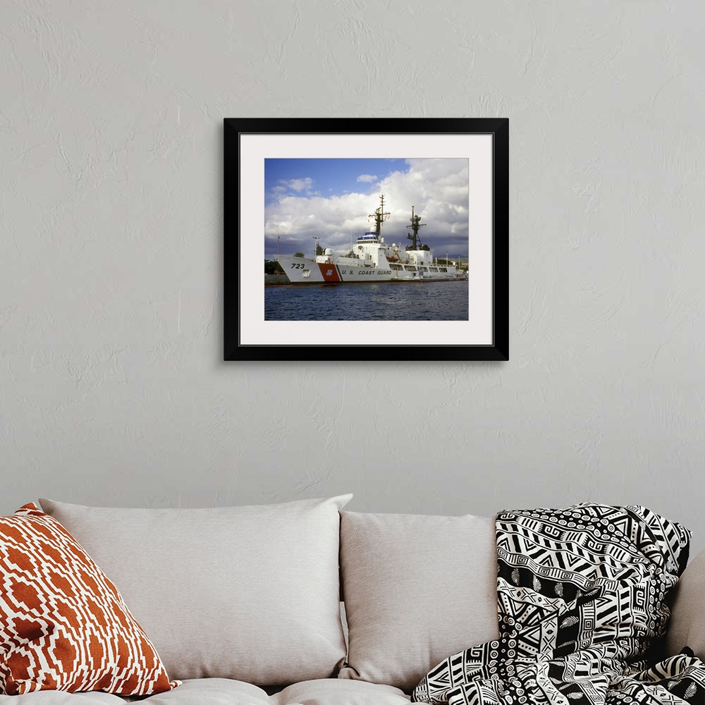 A bohemian room featuring This horizontal photograph is a coast guard ship based out of Hawaii that first launched in 1968 ...