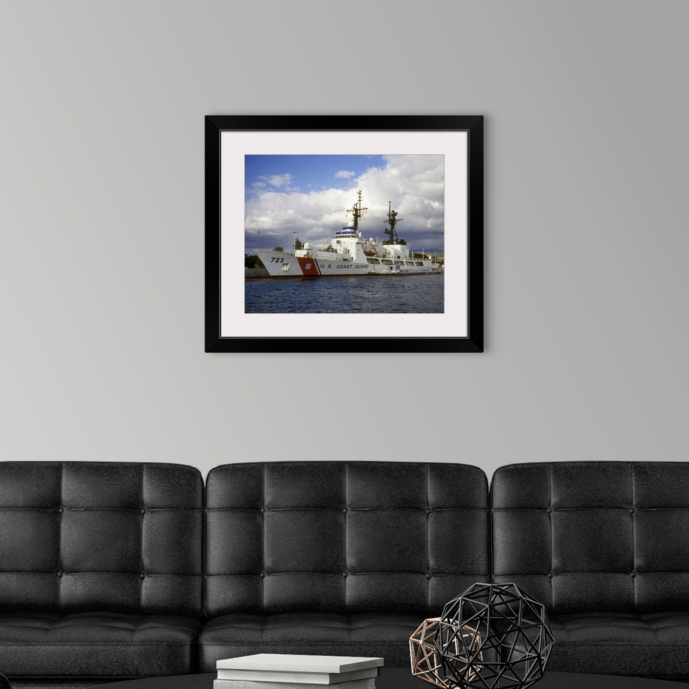 A modern room featuring This horizontal photograph is a coast guard ship based out of Hawaii that first launched in 1968 ...