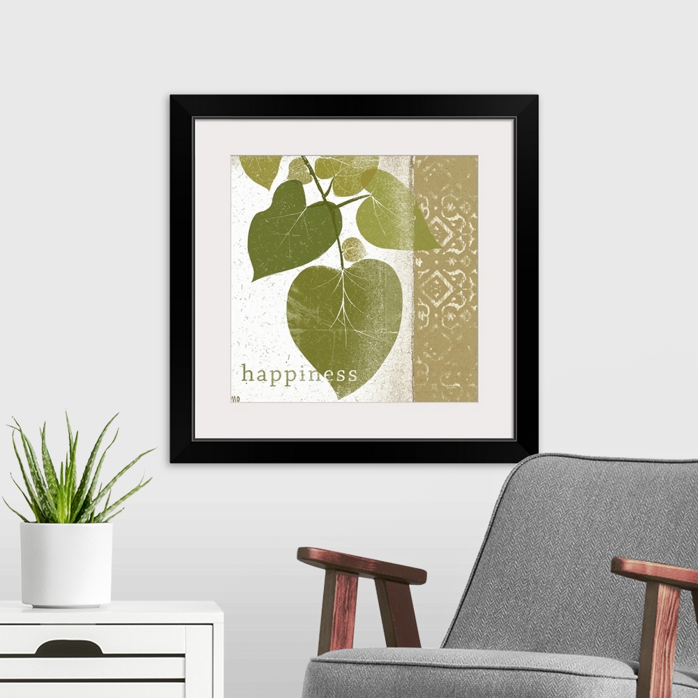 A modern room featuring Photo of a branch of leaves and a design with the word happiness at the bottom.