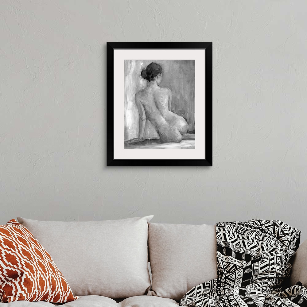 A bohemian room featuring Nude portrait of the back of a seated woman. Her back to the artist the lady stares off into the ...