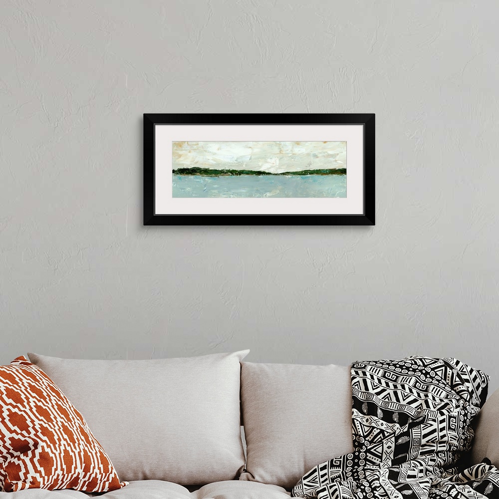 A bohemian room featuring A long, panoramic abstract of a lake or ocean scene, with stormy blue waters under a cloudy sky. ...