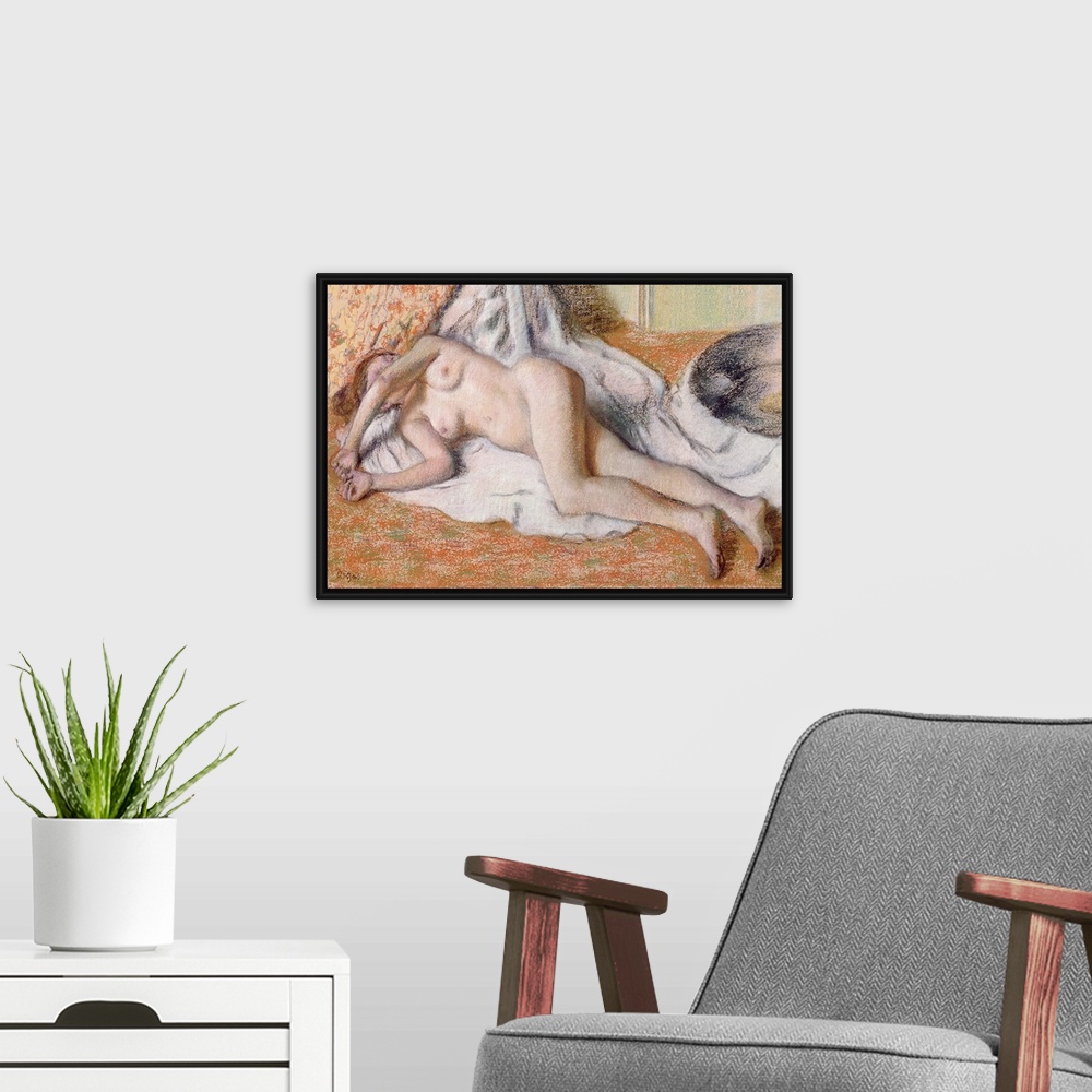 A modern room featuring Horizontal, classic artwork on a big canvas of a nude woman lying on her side on a draping white ...