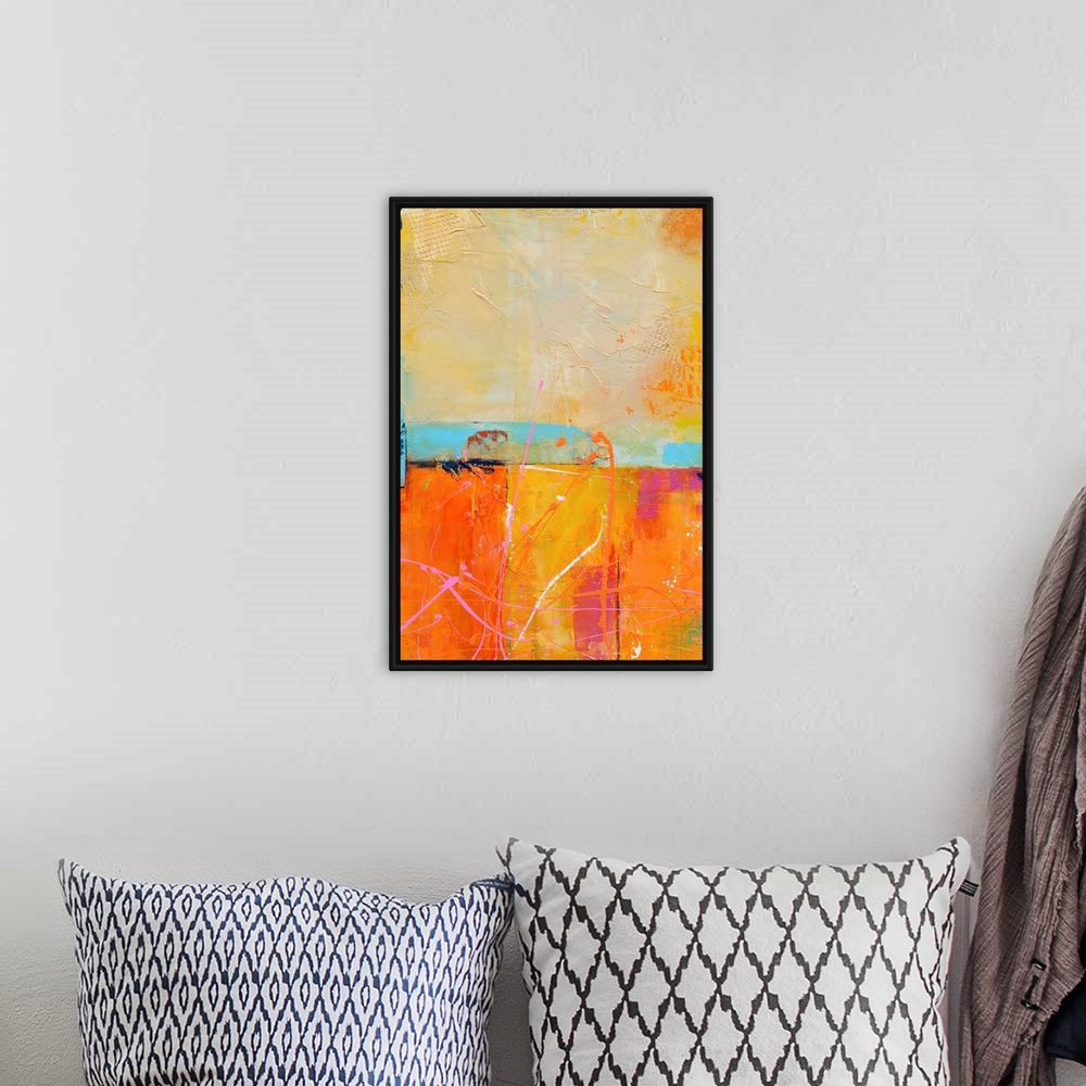 A bohemian room featuring A vertical abstract painting that has a candy color palate with layered textures and colors divid...