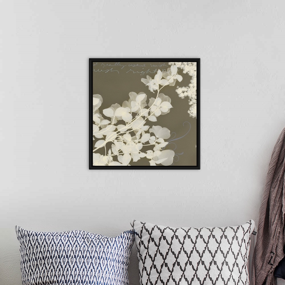 A bohemian room featuring Big square shaped canvas illustration consisting of flowers and inspirational text.