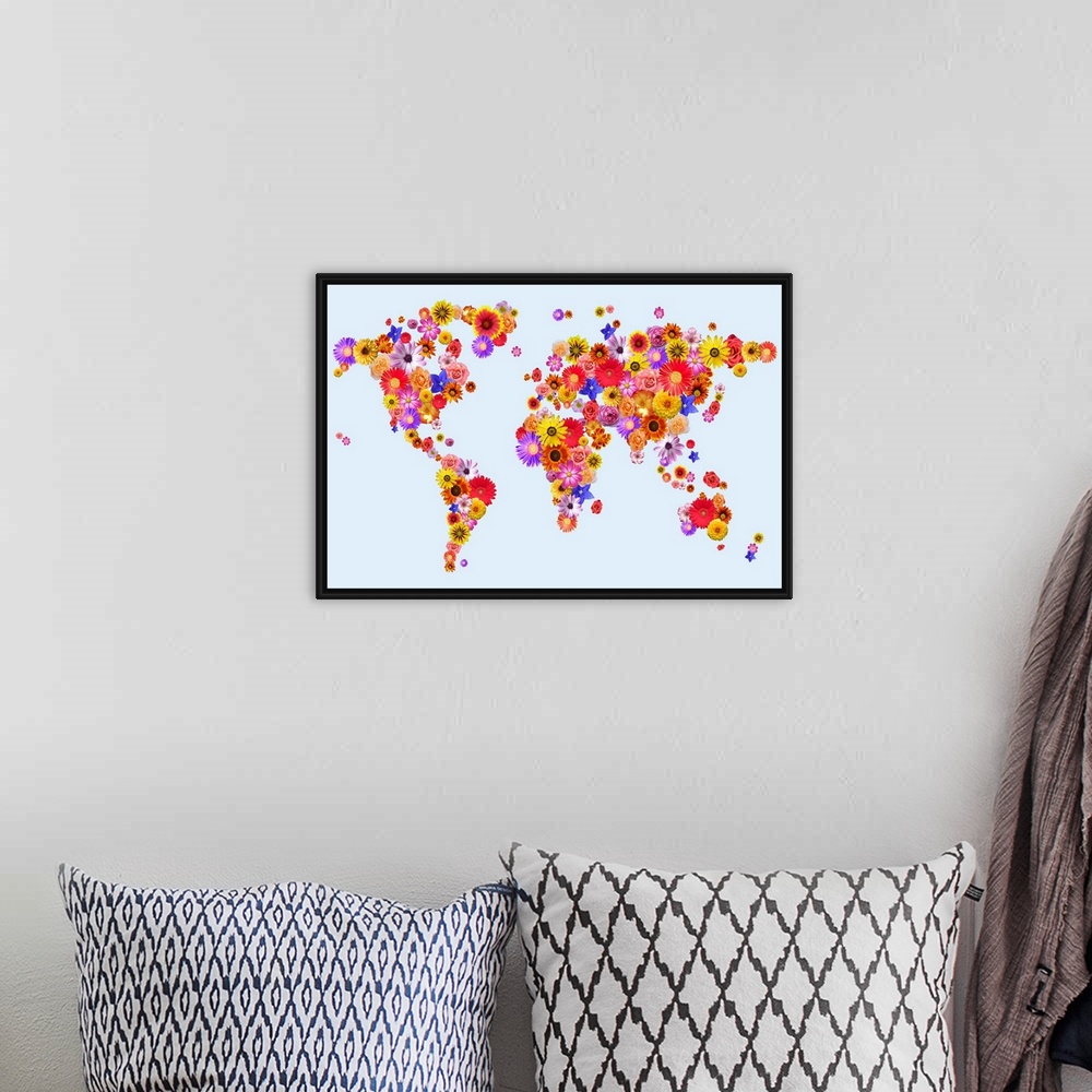 A bohemian room featuring Map of the World made from flowers on a pale blue background. Some of the flowers used include ro...