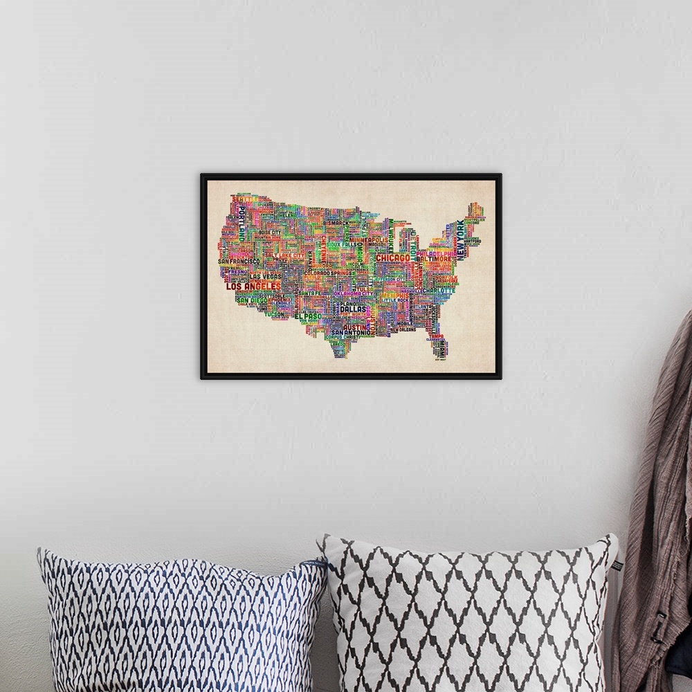 A bohemian room featuring Colorful map of America constructed using the names of each U.S. city.