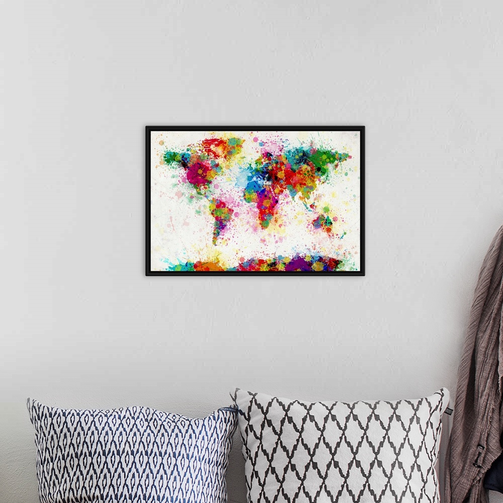 A bohemian room featuring Giant contemporary piece of colorful art that shows a world map composed of a number of paint dro...