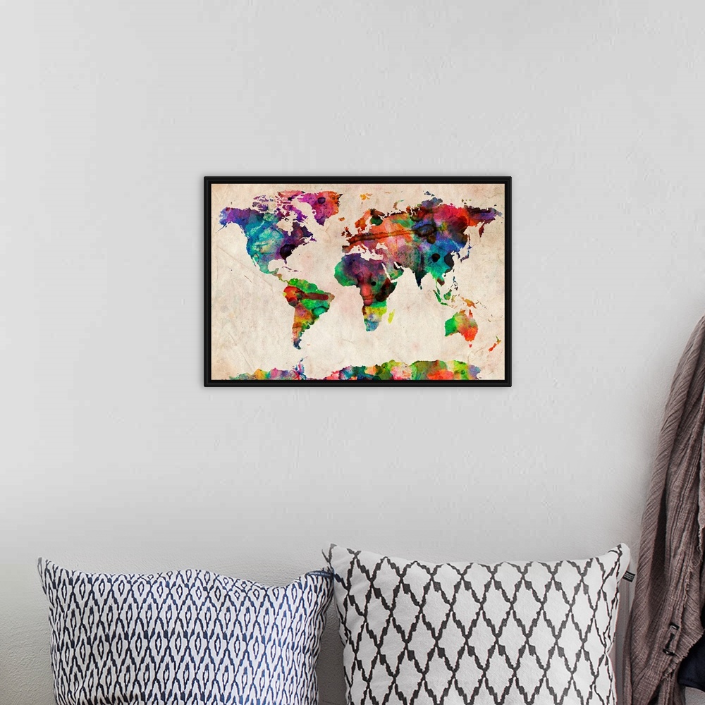 A bohemian room featuring Silhouette of continents filled with wild paint splatters on a textured background showing all th...