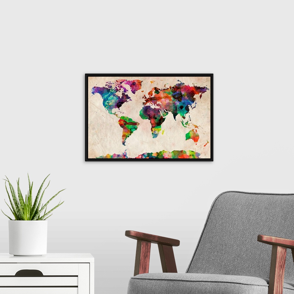 A modern room featuring Silhouette of continents filled with wild paint splatters on a textured background showing all th...