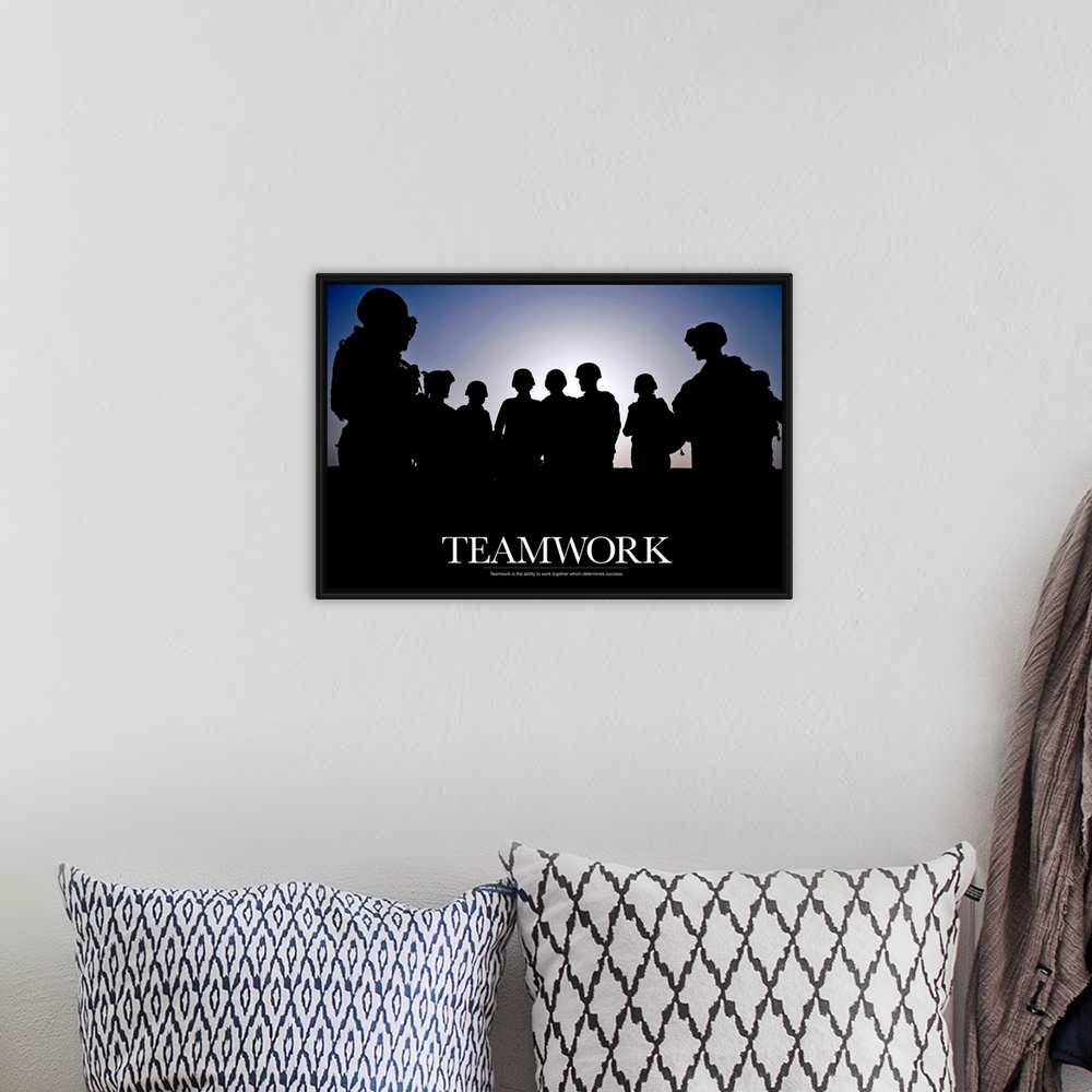 A bohemian room featuring Giant photograph includes a silhouetted group of soldiers that has an inspirational message for t...