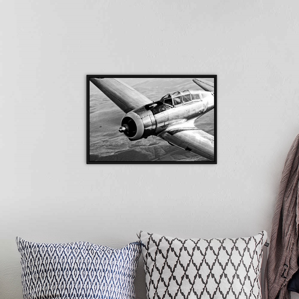 A bohemian room featuring This a close up photograph of a World War II era fighter used by the US military for training exe...