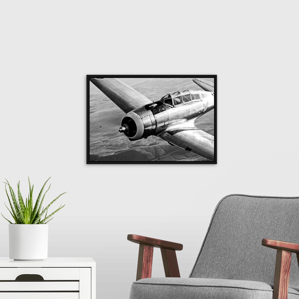 A modern room featuring This a close up photograph of a World War II era fighter used by the US military for training exe...