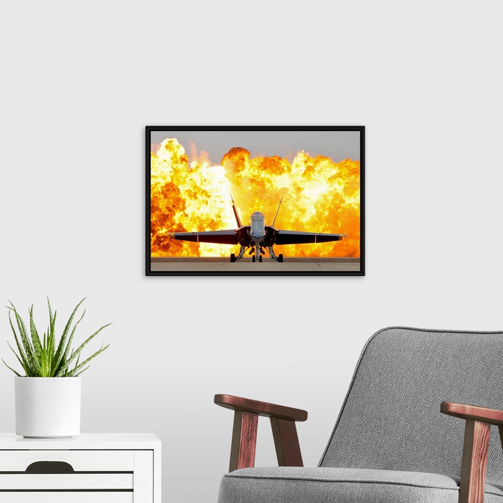 A modern room featuring This is wall art of a photograph dramatically showcasing the aerial prowess of the armed forces a...