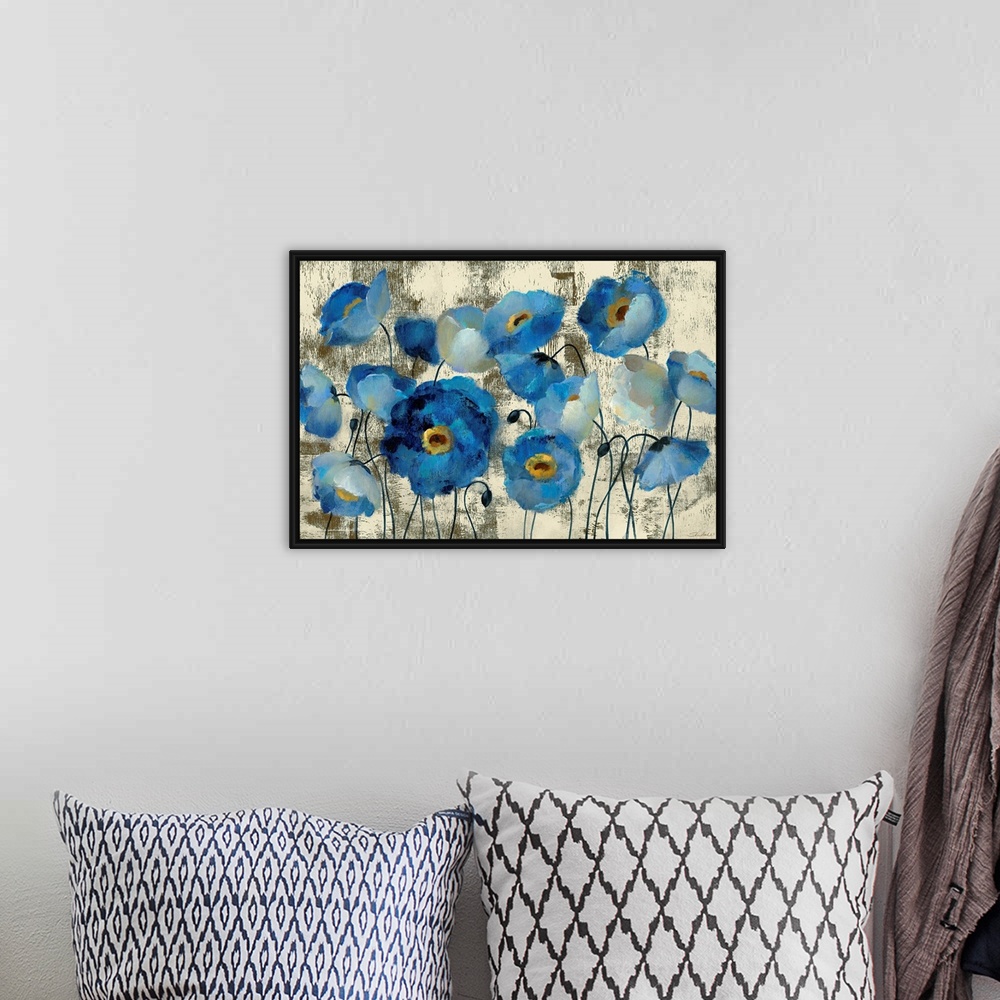 A bohemian room featuring Big contemporary art that illustrates flowers and flower buds against a rough background.