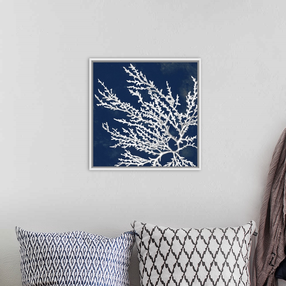 A bohemian room featuring A drawing of coral over a dark ink washes in this square decorative wall art.