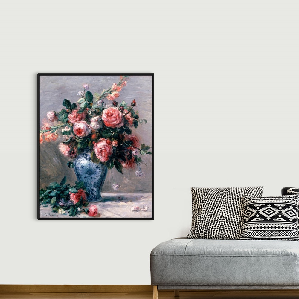 A bohemian room featuring Big classic art depicts an arrangement of flowers within a decorated container sitting on the gro...