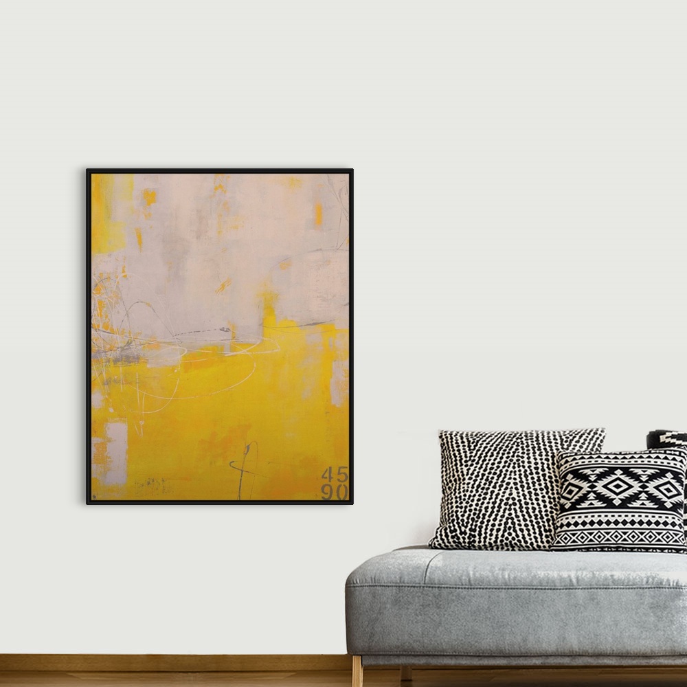 A bohemian room featuring Vertical abstract art work of contrasting paint colors dominating the painting.