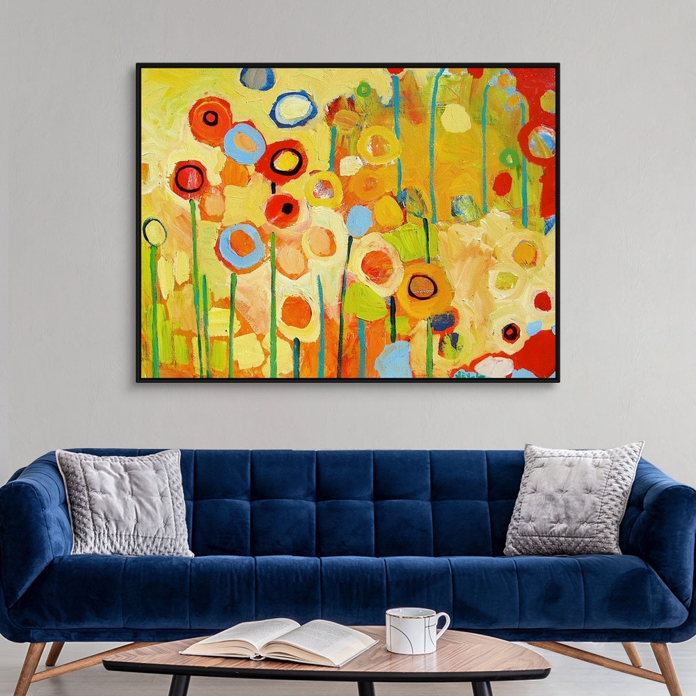 A modern room featuring An abstract still life of colorful circles and lines representing flowers and stems.