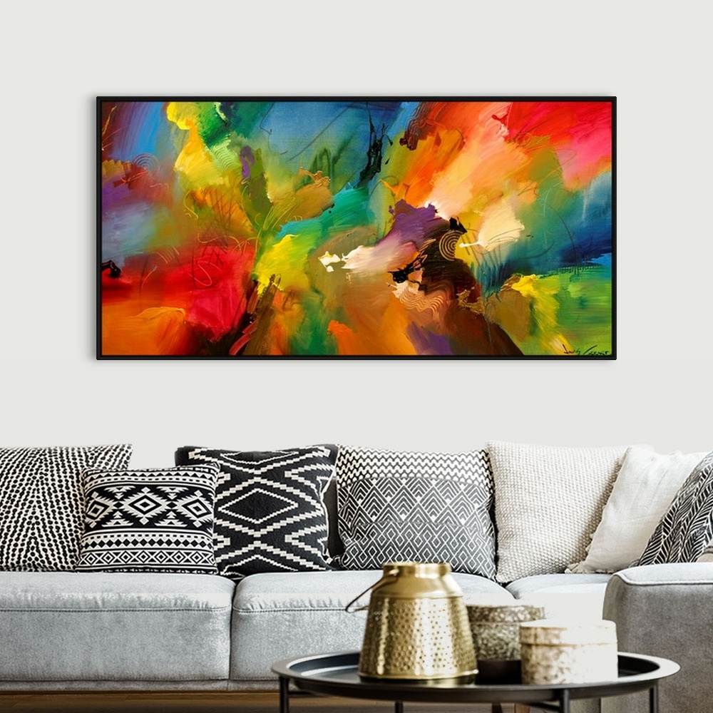 A bohemian room featuring A large abstract painting displaying a multitude of colors and a variety of different textures.