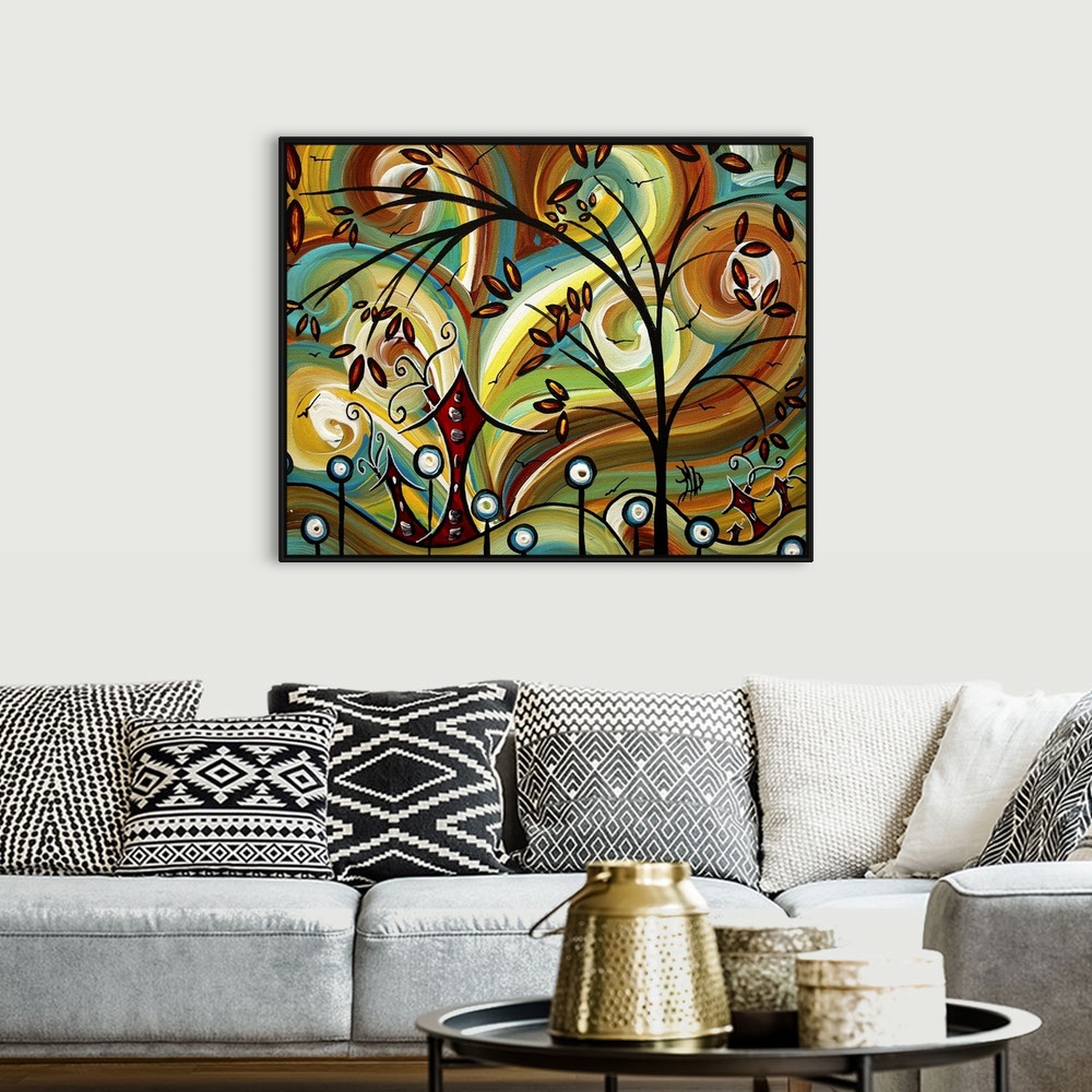 A bohemian room featuring Big contemporary art involving birds flying over a large tree and flowers that are sitting in fro...