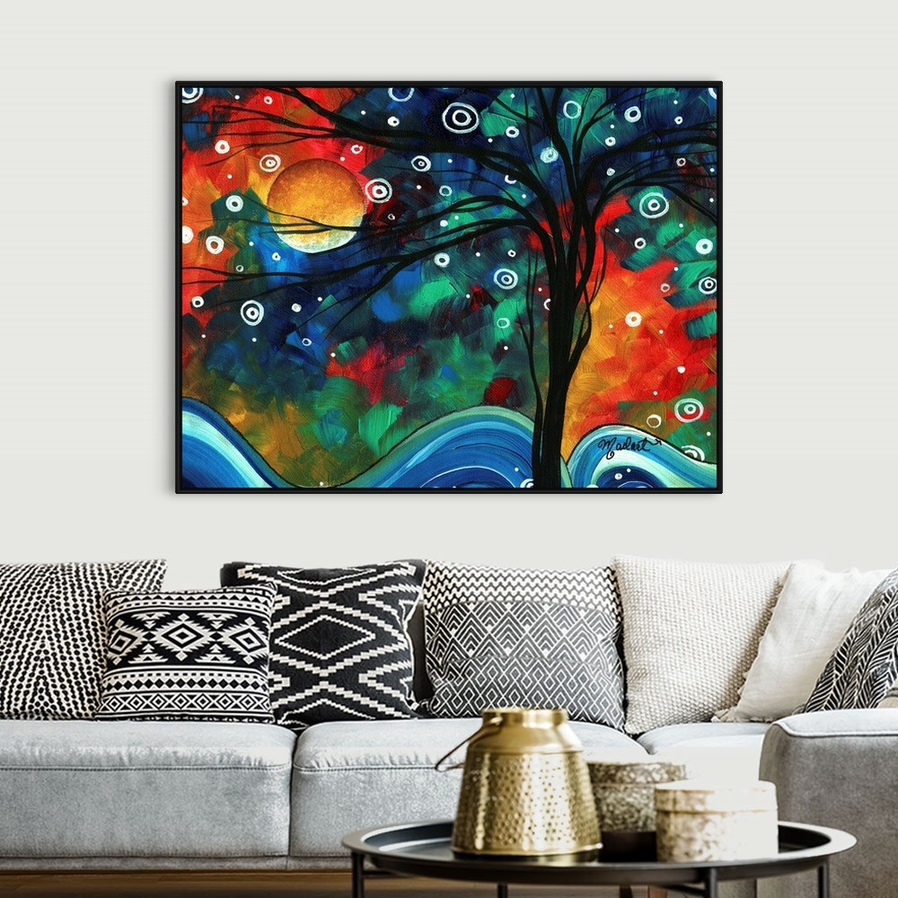 A bohemian room featuring Whimsical painting of bare tree with snowflakes falling and hills of snow on the ground.  The moo...