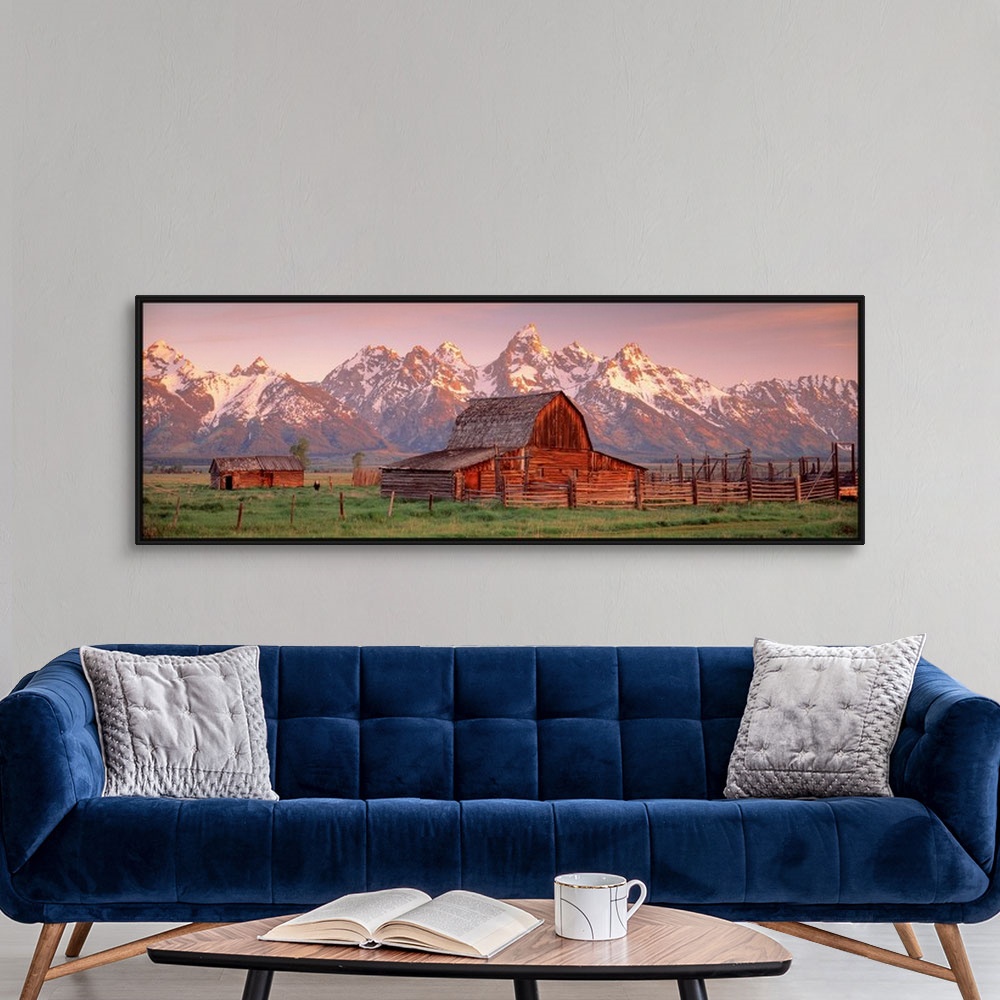 A modern room featuring Panoramic photograph of a large barn on a farm in Grand Teton National Park in Wyoming. Located i...