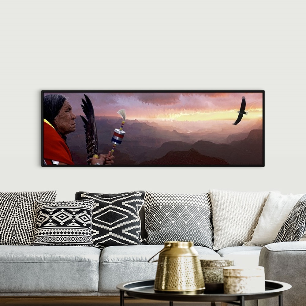 A bohemian room featuring Giant panoramic artwork featuring a Native American figure and flying bird with a vast mountain r...