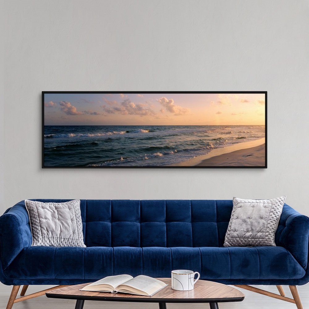 A modern room featuring Panoramic photograph showcases waves of the Atlantic Ocean making their way to the Florida shore ...