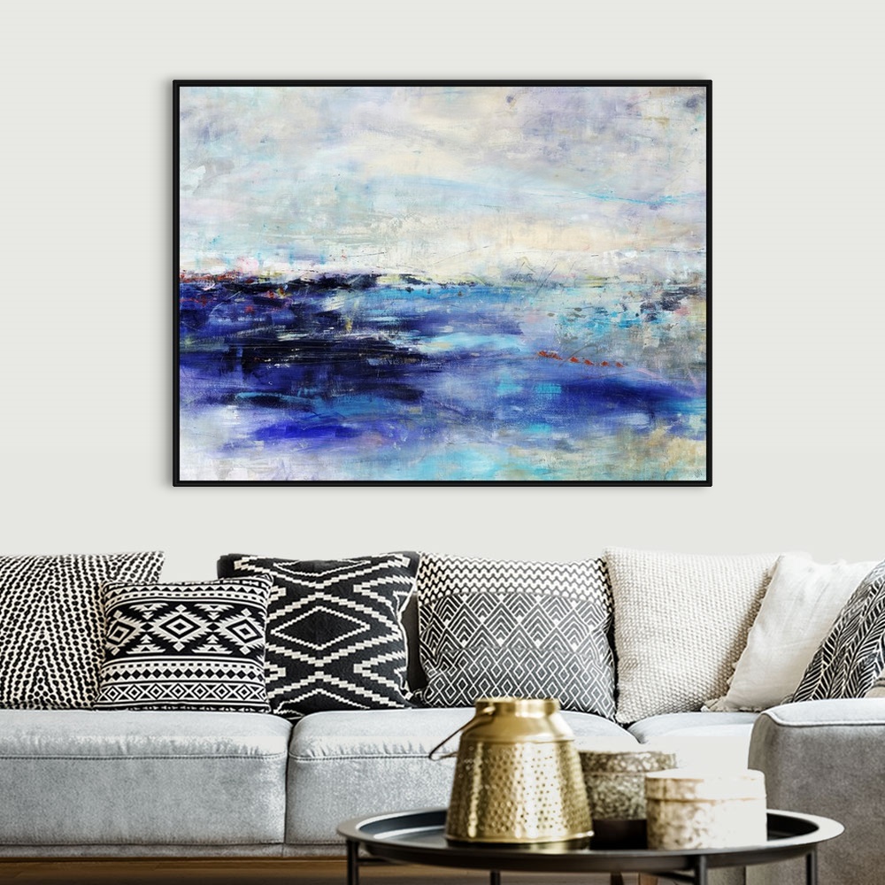 A bohemian room featuring Abstract painting of an island made up of large brush stroke textures.