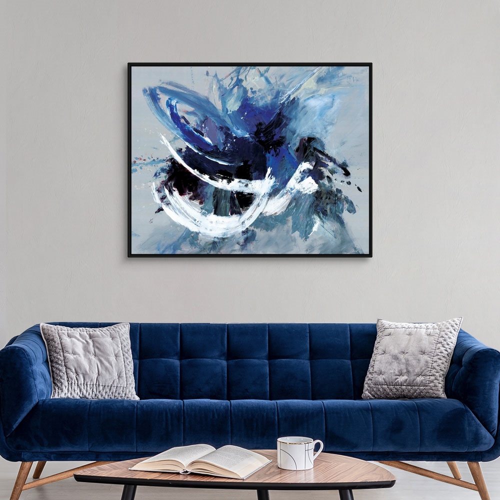 A modern room featuring Contemporary abstract artwork in blue, black, and white in broad, fast brushstrokes.