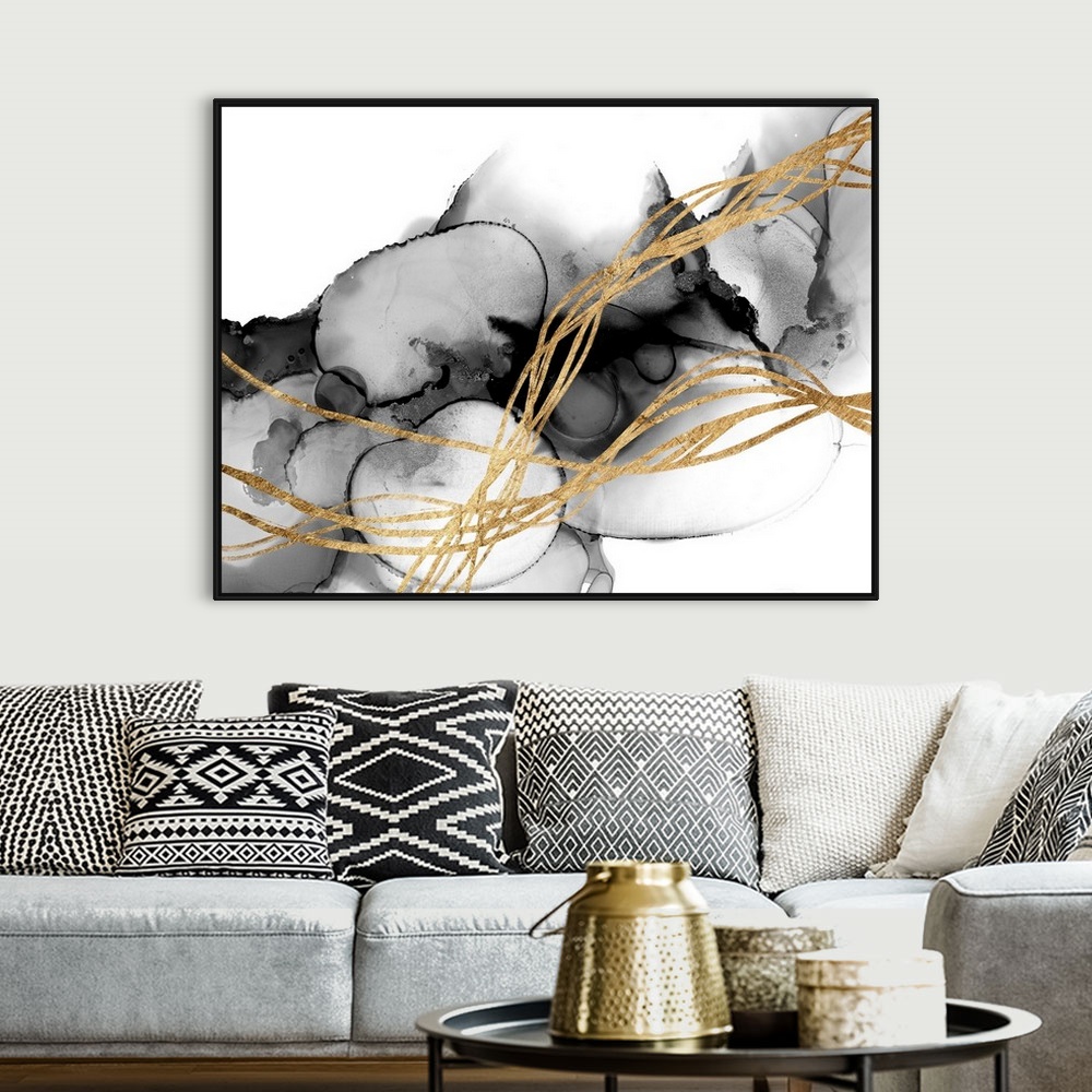 A bohemian room featuring A stunning abstract piece featuring waves of gold atop a smoky, inky, fluid background. The combi...