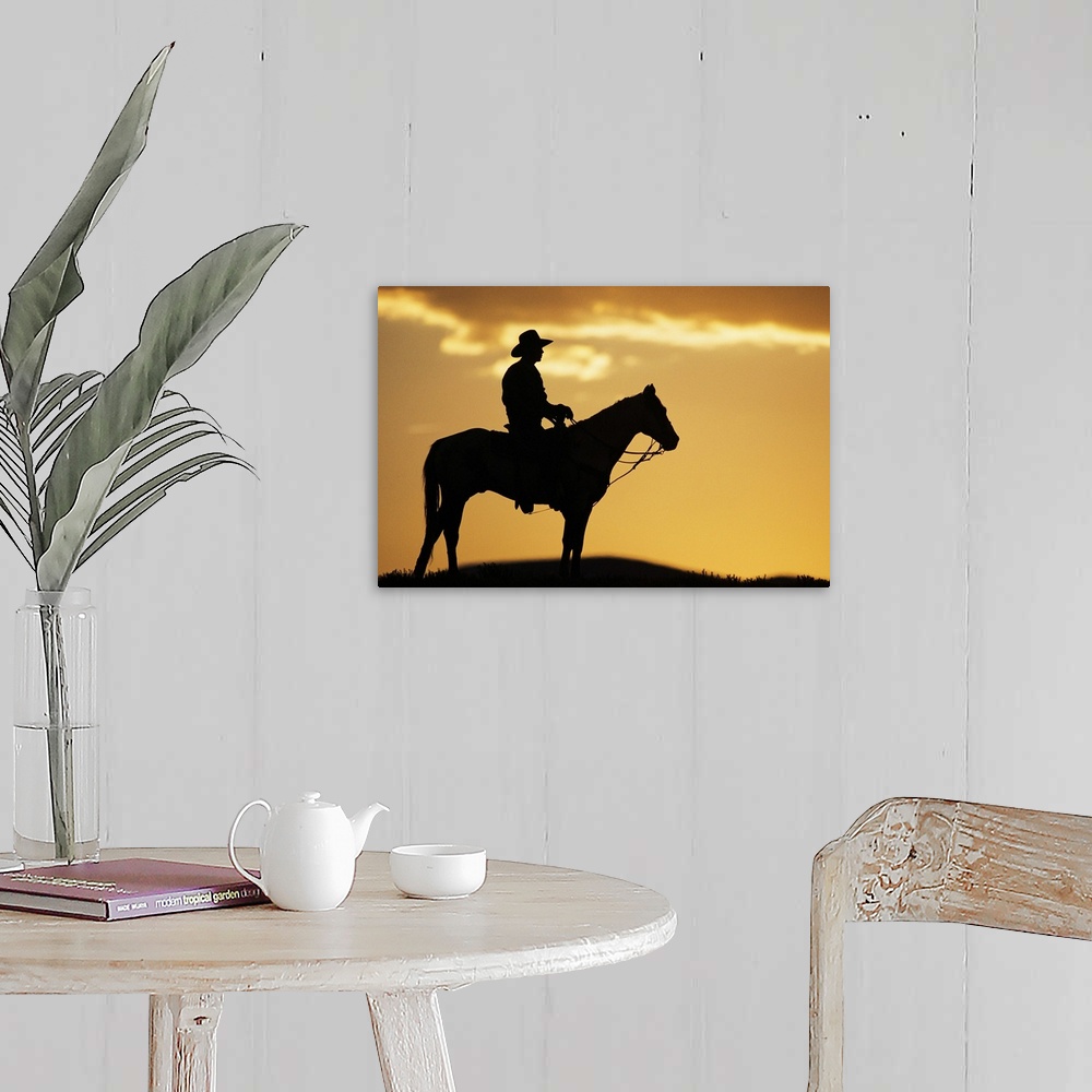 Silhouette of cowboy on horseback at sunset or sunrise Wall Art, Canvas ...